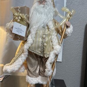 Elegant Gold and White Santa Figurine
